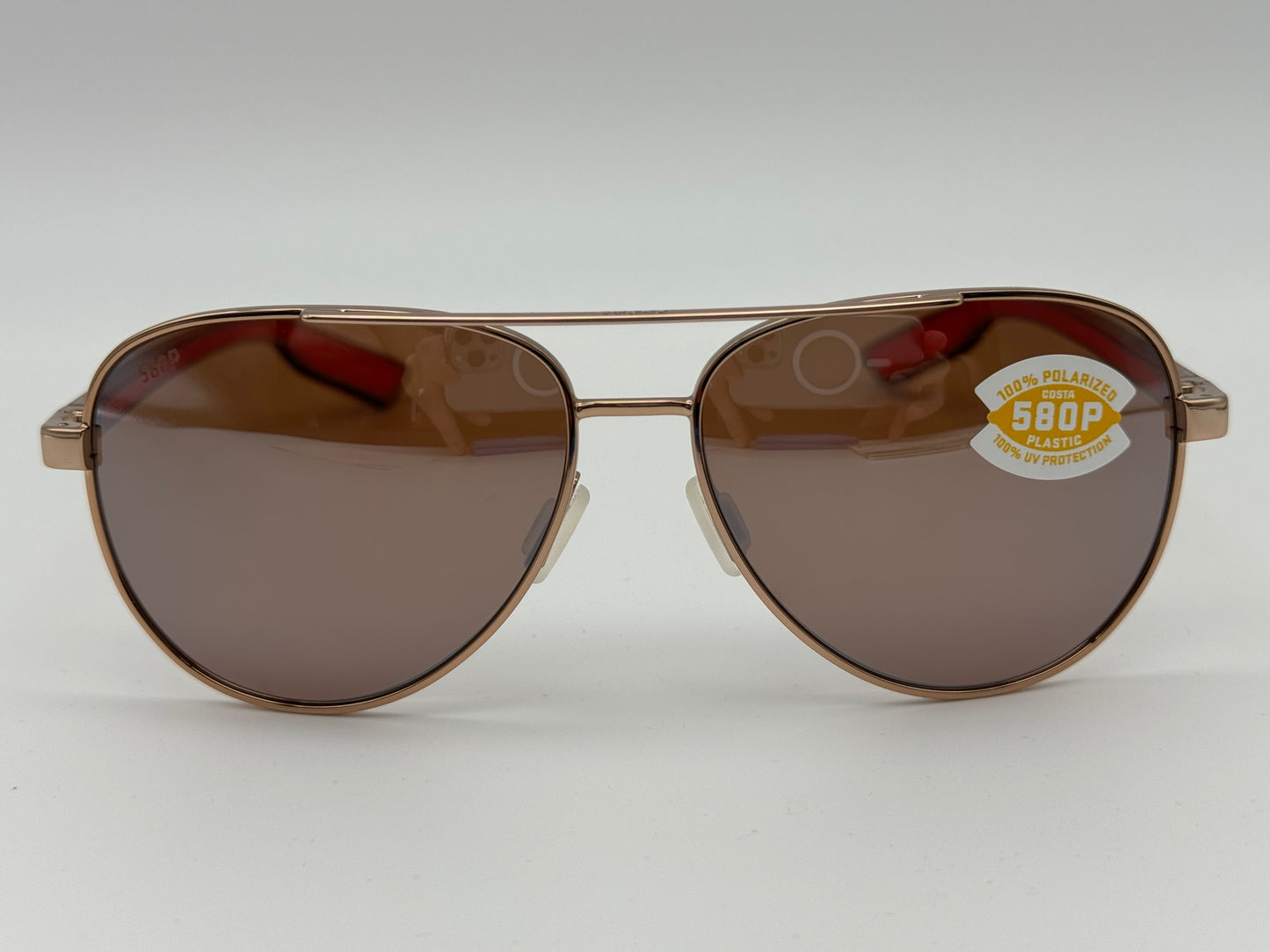 Costa Peli 57mm Shiny Rose Gold / Copper Silver Mirror Polarized 580P Polycarbonate Lens NEW