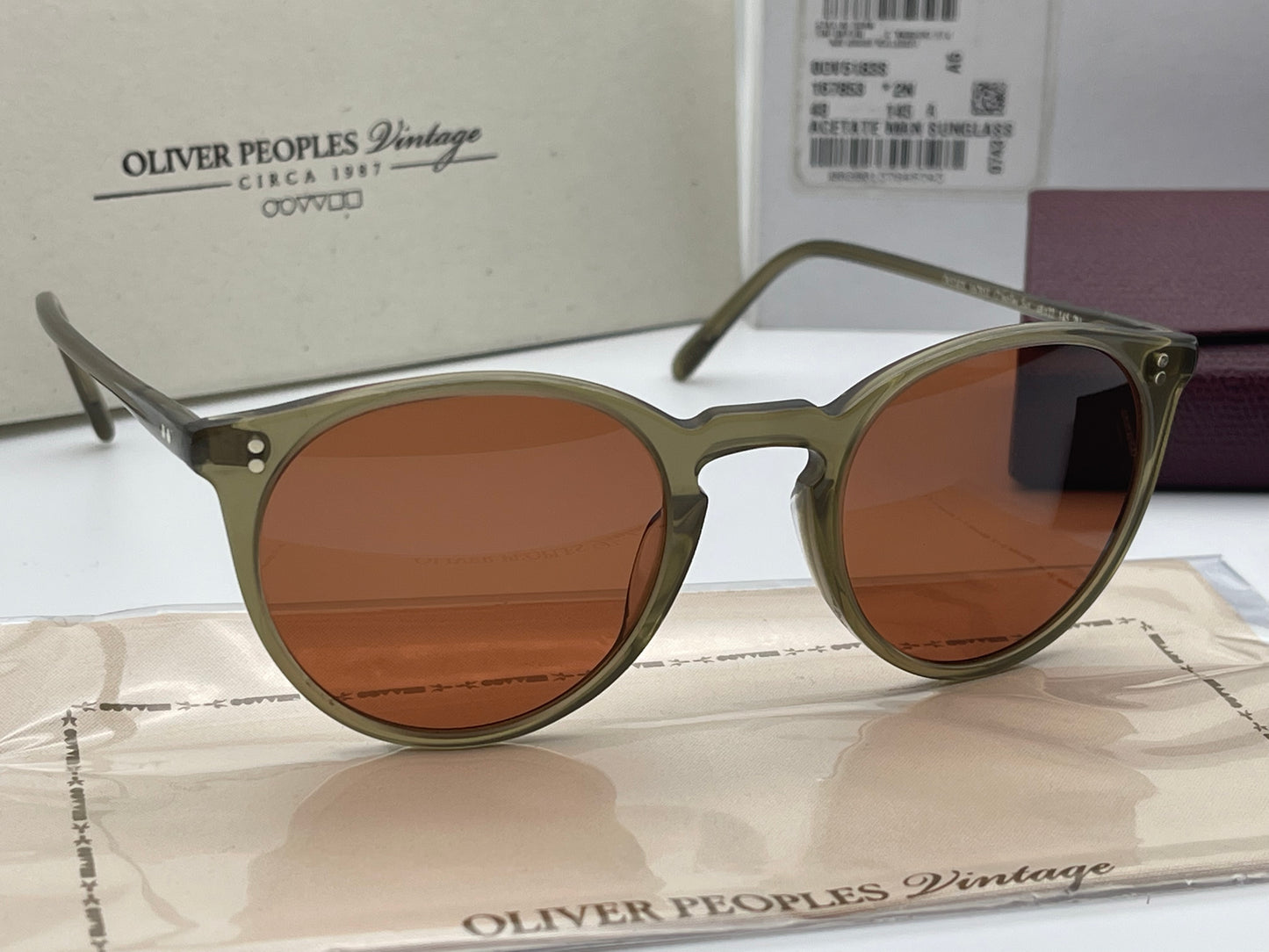 Oliver Peoples O'Malley Sun 48mm Dusty Olive Frames Persimmon Lenses