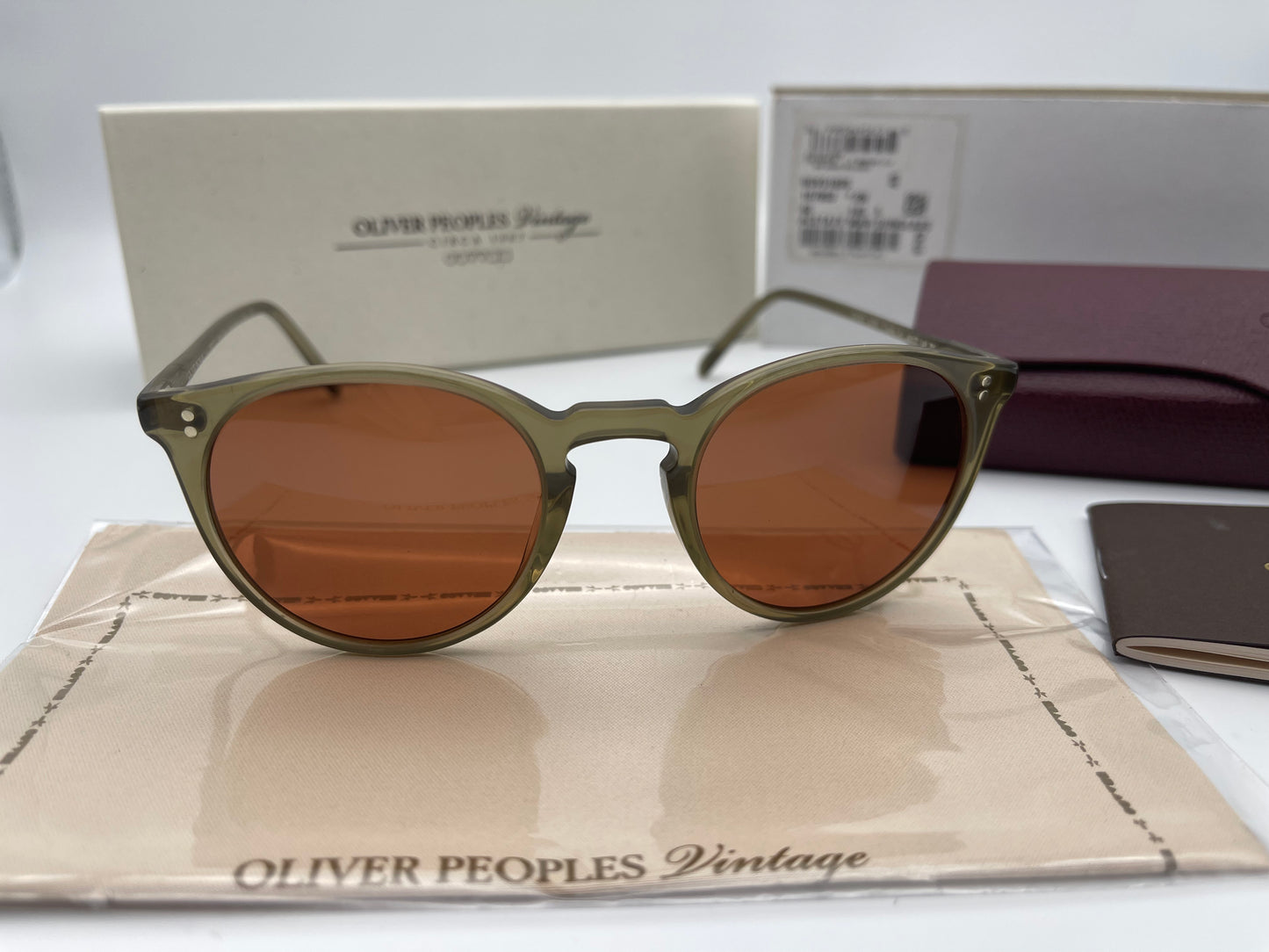 Oliver Peoples O'Malley Sun 48mm Dusty Olive Frames Persimmon Lenses